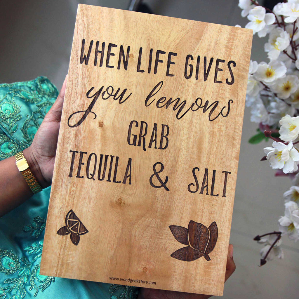 https://www.woodgeekstore.com/cdn/shop/products/when-life-gives-you-lemons-grab-tequila-and-salt-engraved-quote-on-wood-square_1024x1024.jpg?v=1660387824